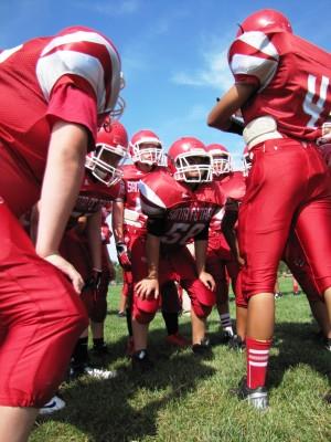 photo of football huddle 