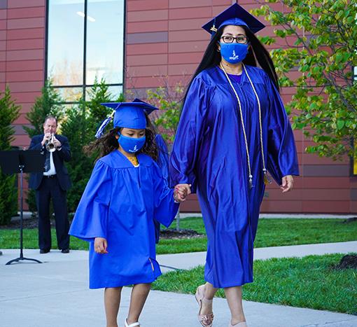 photo of mom and daughter in cap and gown