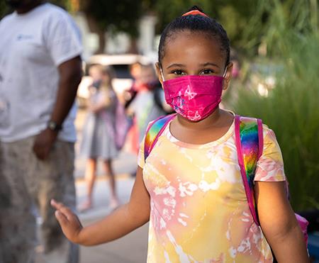 photo of girl wearing mask
