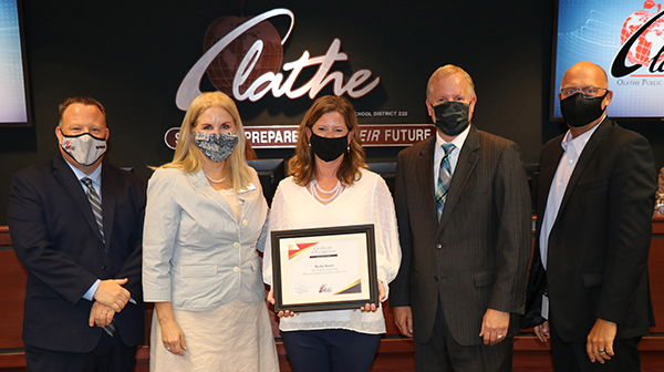 photo of honoree holding certificate