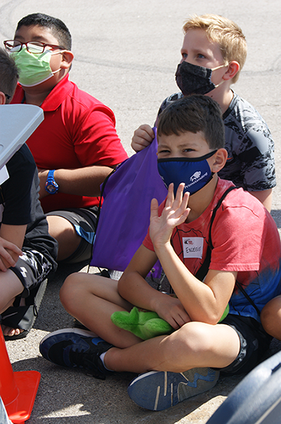 photo of students listening closely