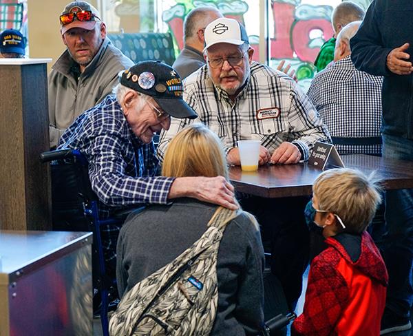 veteran talks with students