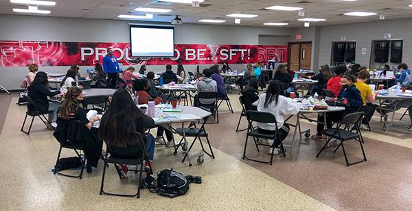 Future Educators Academy students ang middle school students at Saturday School