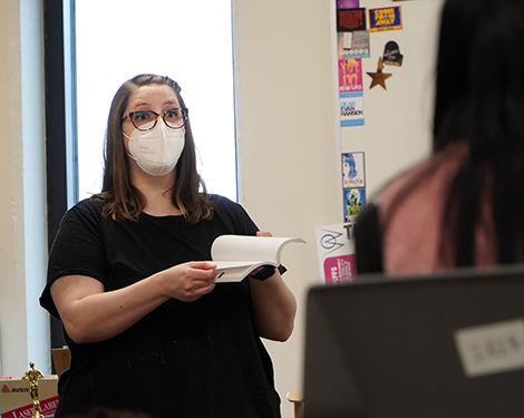 teacher looks with surprise at student