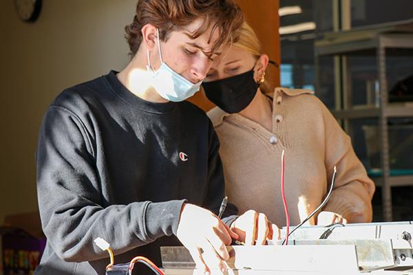 students work together on Green Tech project