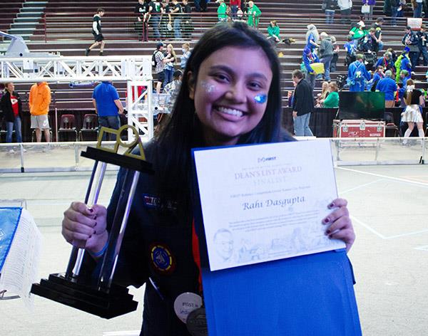 Rahi Dasgupta holds trophy