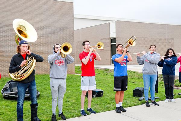 band members play instruments