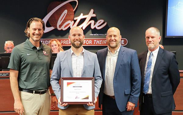 Andy Weber is recognized by the board