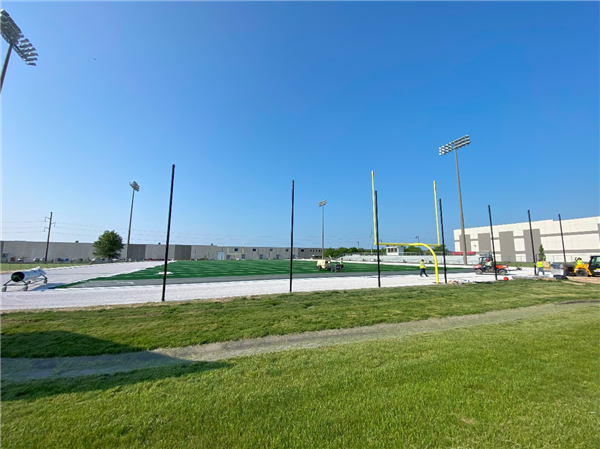 new turf being laid at ODAC