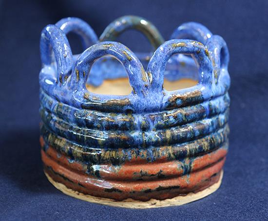 blue and brown ceramic coil pot