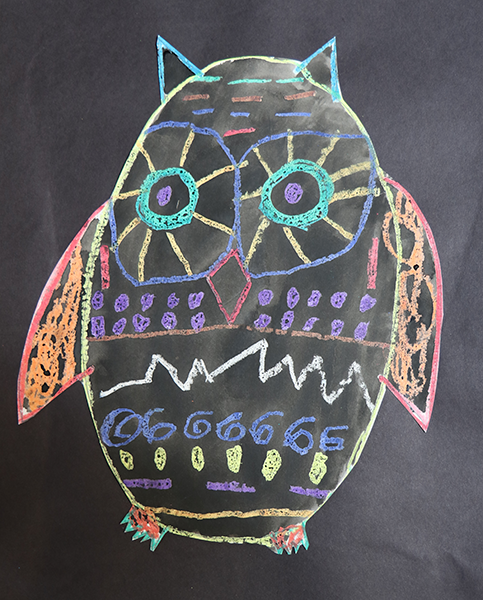owl drawn with crayons on construction paper