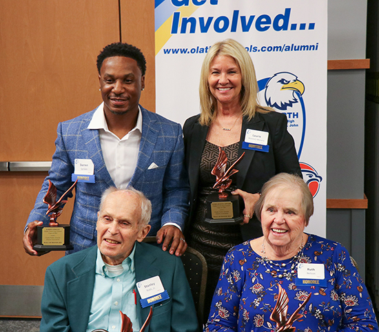four honorees gathered for a photo