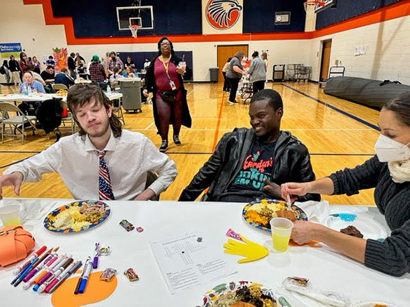 students dine on veggies they grew