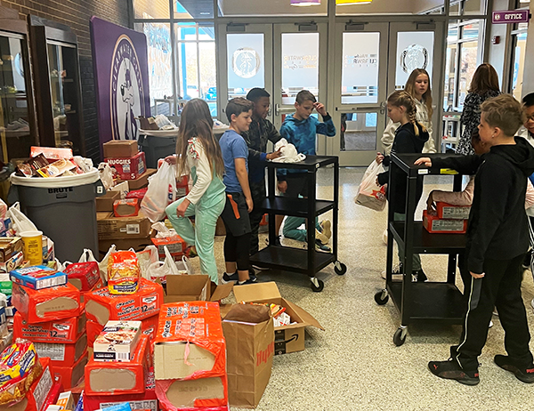 students sort donated food