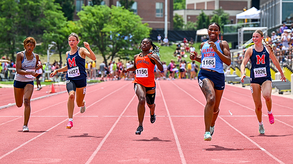 girls running on track