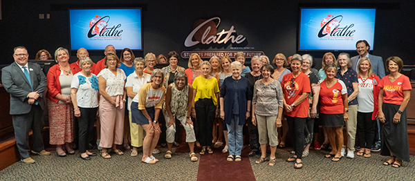 large group of people honored by board of education
