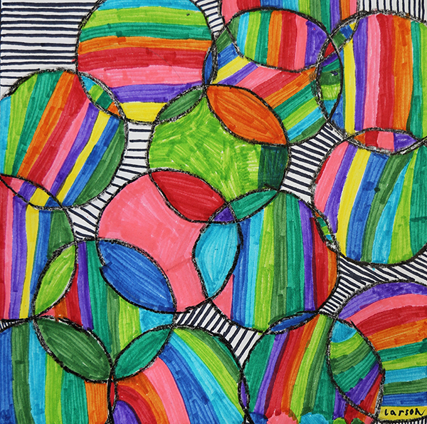 overlapping circles drawn with black crayon and colored markers