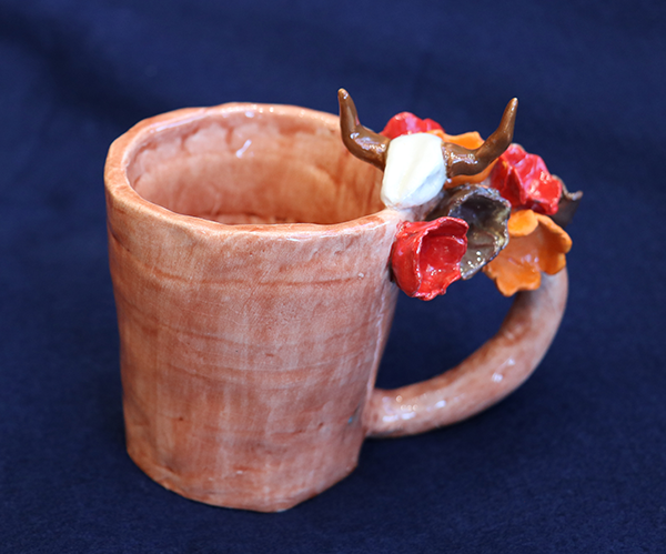 clay mug with O'Keeffe inspired elements
