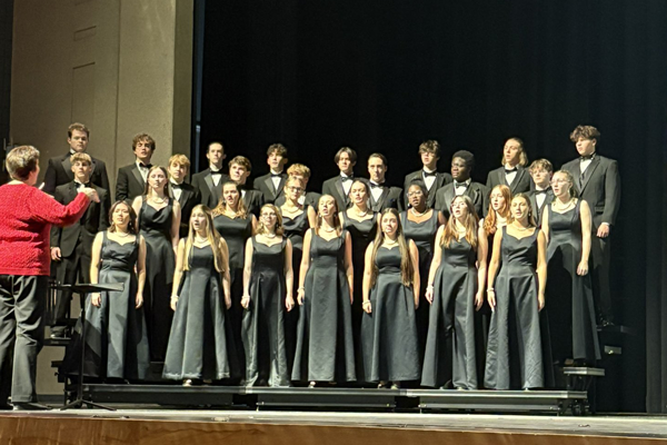 choir sings from the stage