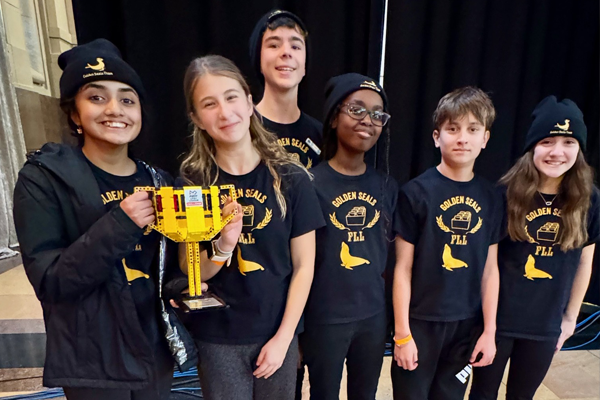 students hold their regional award