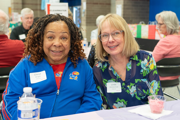 two women enjoy the volunteer celebration