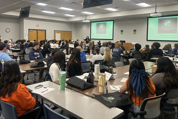 room full of students listen to guest speaker